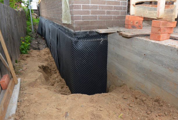 Happy homeowners after waterproofing job in Olivehill